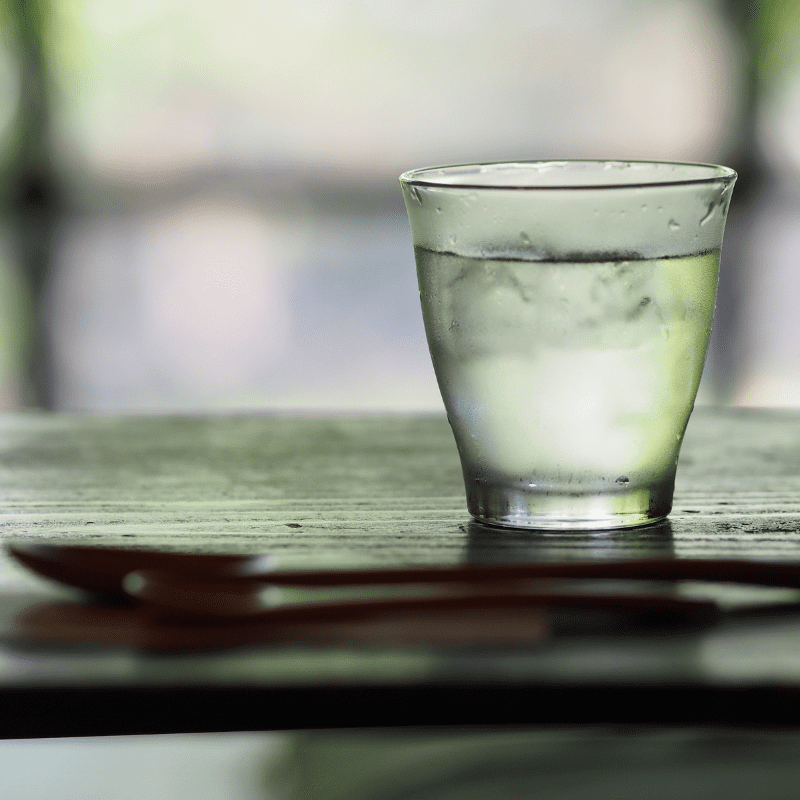 A glass of water with ice.